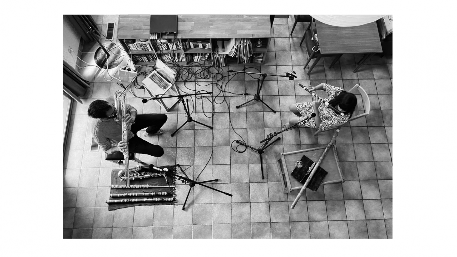 Violeta Motta and Sylvain Monchoce playing the flute during a recording session